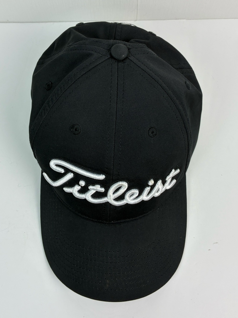 Titleist Tour Performance hat featuring embroidered Spectrum on the back OS
